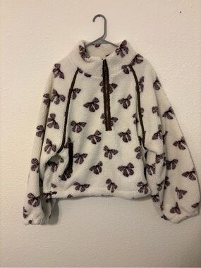 Shop Talulah Cream Sherpa Pullover with Brown Bow Print